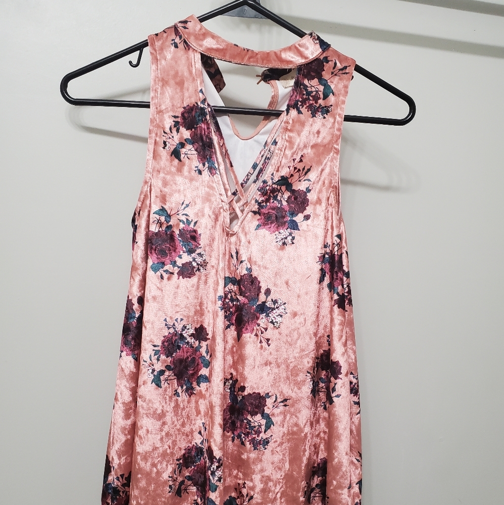 A cute dark pink, velvet, sleeveless top